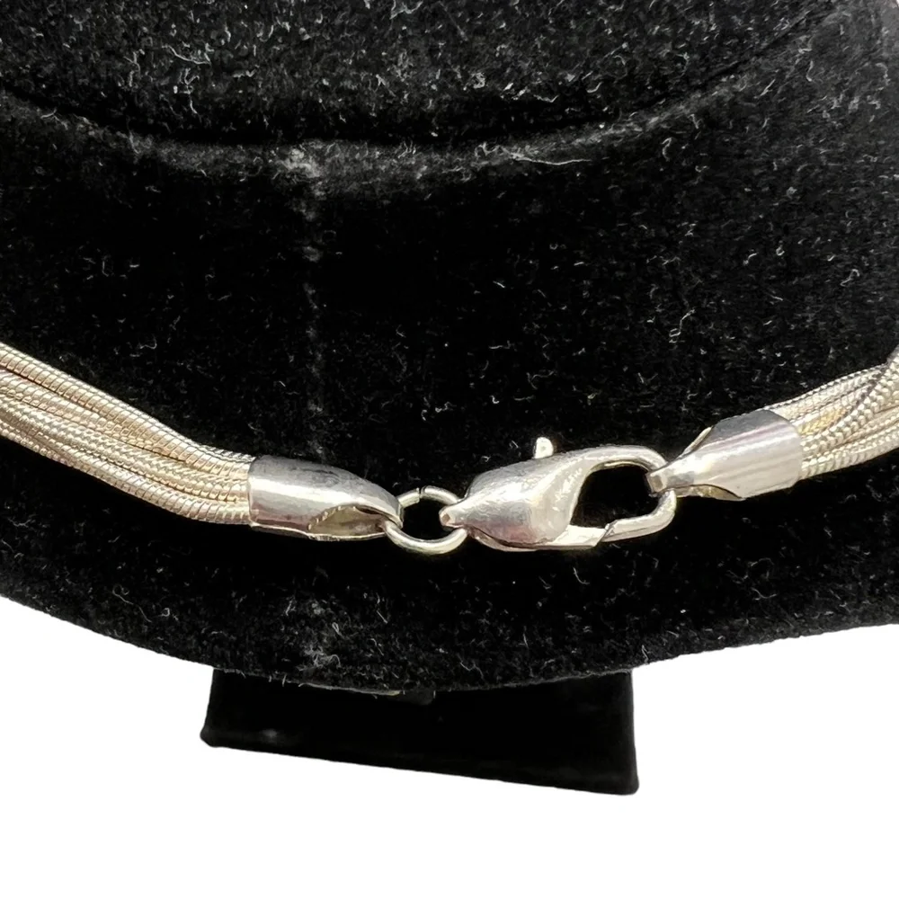 VINTAGE 6 CHAIN SILVER TONE NECKLACE WITH TEARDROP PENDANT WITH BLACK STONE